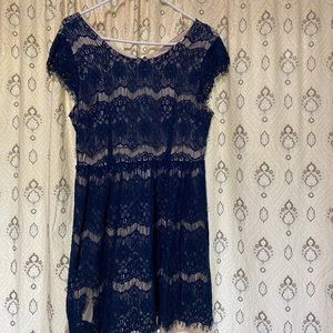 Navy blue dress. Cream under and blue lace overlay